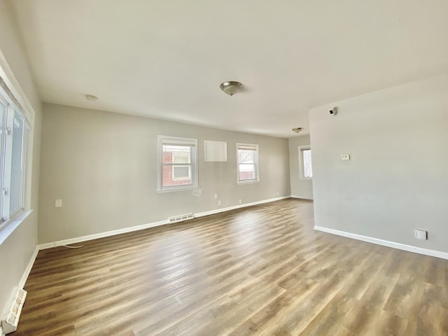 351 Clyde Ave, Calumet City, IL 60409 - entryway with wood finished floors, visible vents, and baseboards
