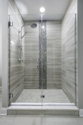 bathroom featuring a shower stall