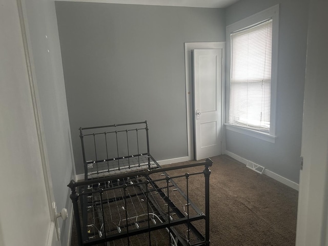 651 Douglas Ave, Calumet City, IL 60409 - bedroom featuring visible vents, baseboards, and carpet flooring