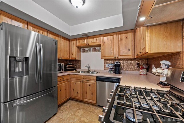 602 S Vista Dr, Algonquin, IL 60102 - kitchen with stainless steel appliances, a sink, light countertops, and backsplash