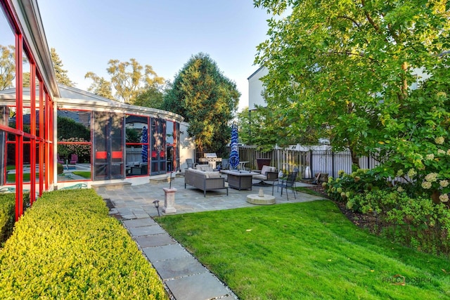 view of yard with an outdoor fire pit, a patio, and fence