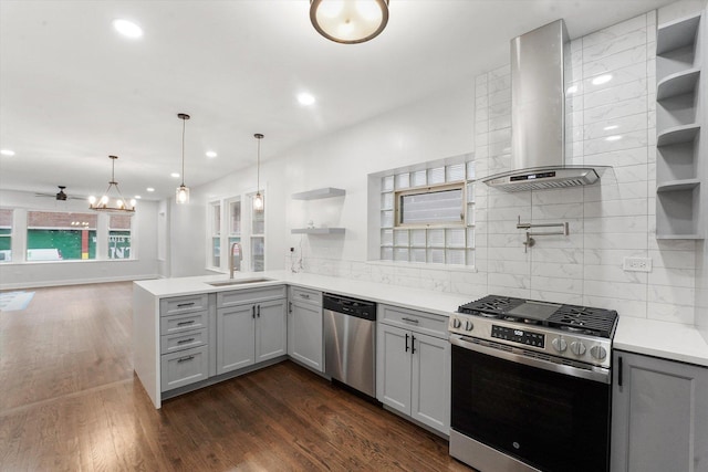 3012 N Knox Ave, Chicago, IL 60641 - kitchen featuring open shelves, a sink, gray cabinetry, stainless steel appliances, and wall chimney range hood