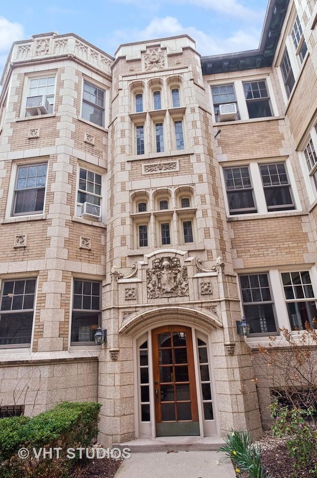 view of building exterior with cooling unit
