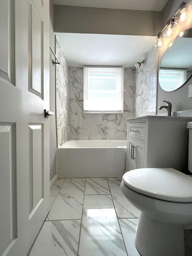 bathroom with marble finish floor,  shower combination, toilet, and vanity