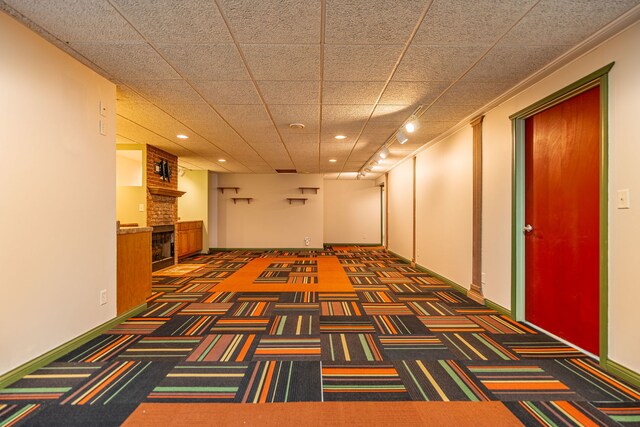 hallway with recessed lighting and carpet