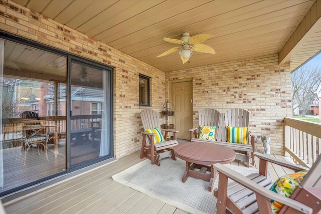 exterior space featuring ceiling fan