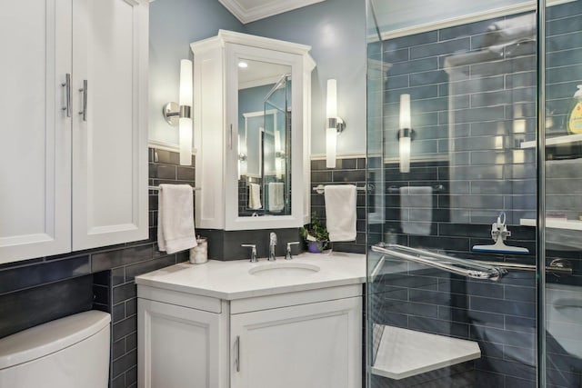 5842 N Kingsdale Ave, Chicago, IL 60646 - bathroom featuring crown molding, a stall shower, tile walls, toilet, and vanity
