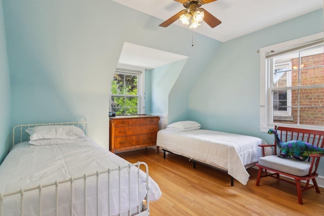 5842 N Kingsdale Ave, Chicago, IL 60646 - bedroom with wood finished floors, lofted ceiling, and ceiling fan