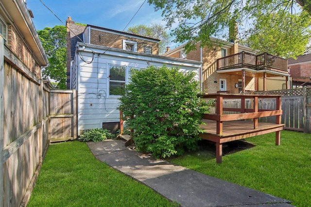5842 N Kingsdale Ave, Chicago, IL 60646 - rear view of house featuring a wooden deck and a chimney