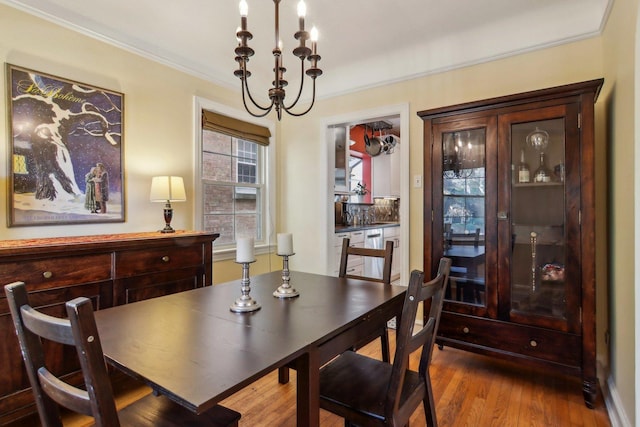 5842 N Kingsdale Ave, Chicago, IL 60646 - dining area featuring wood finished floors and ornamental molding