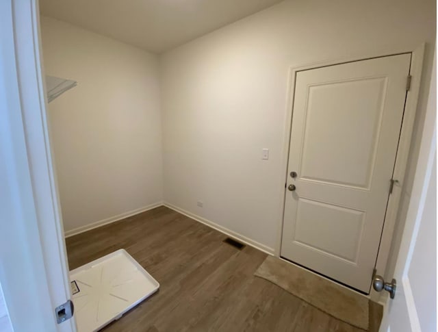 32004 Savannah Dr, Lakemoor, IL 60051 - spare room featuring dark wood-type flooring and baseboards