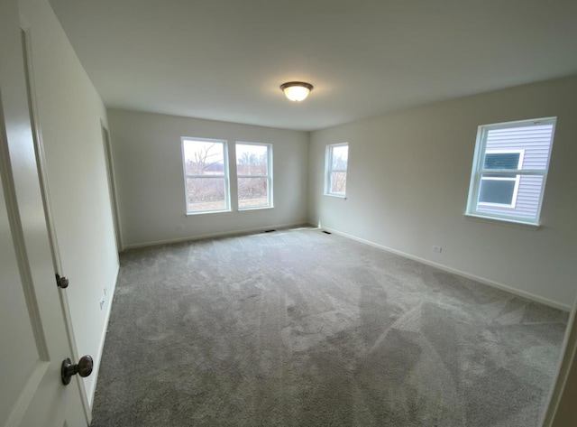 32004 Savannah Dr, Lakemoor, IL 60051 - spare room with carpet floors and baseboards