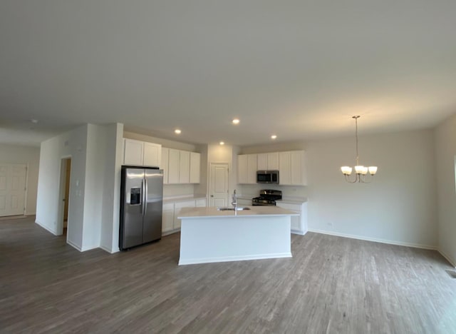 32004 Savannah Dr, Lakemoor, IL 60051 - kitchen with appliances with stainless steel finishes, white cabinets, dark wood-style flooring, open floor plan, and recessed lighting