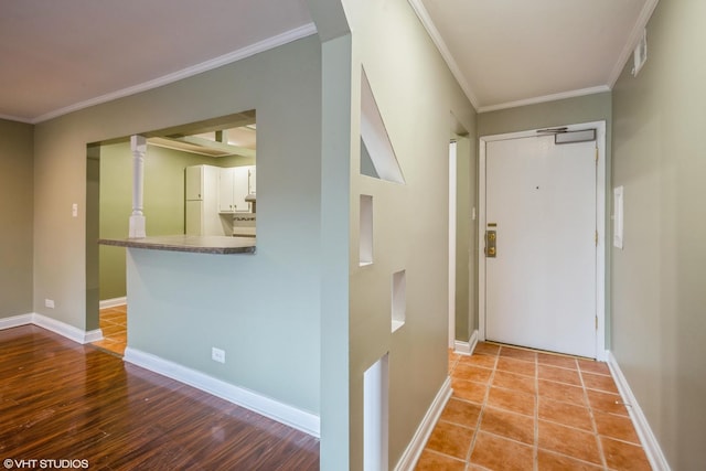 675 Grove Dr Unit 204, Elk Grove Village, IL 60007 - corridor with light wood-style floors, ornamental molding, and baseboards