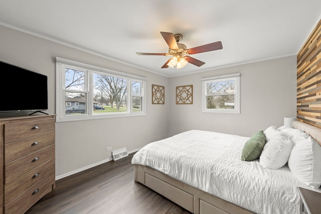 4N210 Norris Ave, West Chicago, IL 60185 - bedroom featuring dark wood-style floors, visible vents, a ceiling fan, crown molding, and baseboards