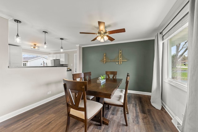 4N210 Norris Ave, West Chicago, IL 60185 - dining area featuring baseboards, a ceiling fan, dark wood-style floors, and crown molding