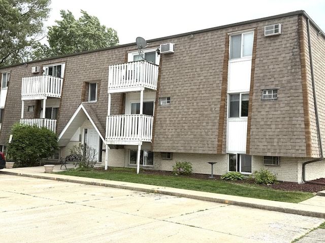 2356 Gaylord Rd Unit 2D, Crest Hill, IL 60403 - view of property featuring a wall mounted AC