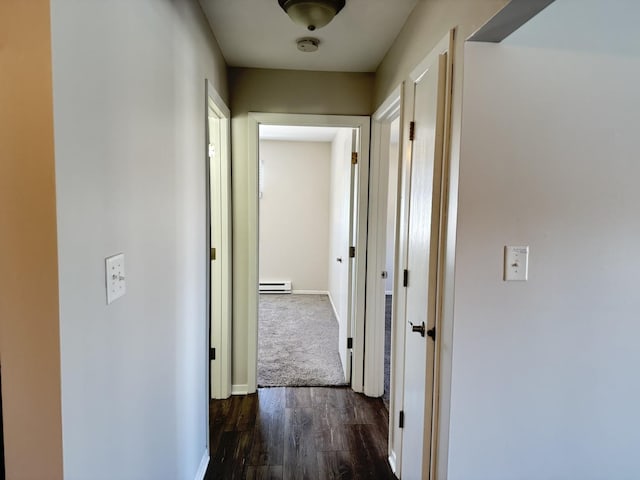 2356 Gaylord Rd Unit 2D, Crest Hill, IL 60403 - corridor featuring baseboard heating, dark wood-type flooring, and baseboards
