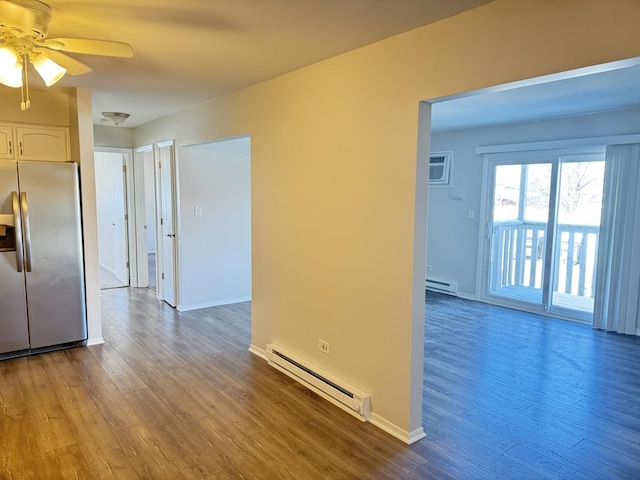 2356 Gaylord Rd Unit 2D, Crest Hill, IL 60403 - empty room with baseboard heating, dark wood-type flooring, and a ceiling fan