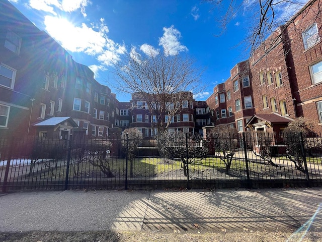 6634 S Greenwood Ave Unit 3B, Chicago, IL 60637 - exterior space featuring fence and a residential view
