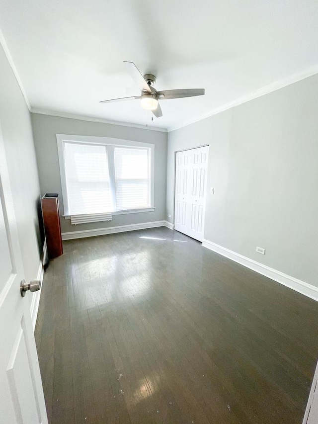 6634 S Greenwood Ave Unit 3B, Chicago, IL 60637 - unfurnished room featuring baseboards, dark wood-style floors, a ceiling fan, and crown molding