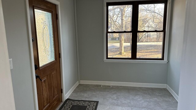 entrance foyer with visible vents and baseboards