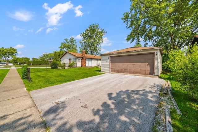 17433 Appletree Dr, Hazel Crest, IL 60429 - ranch-style house featuring a detached garage, a front yard, and an outdoor structure