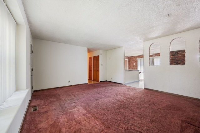 17433 Appletree Dr, Hazel Crest, IL 60429 - spare room with carpet and a textured ceiling