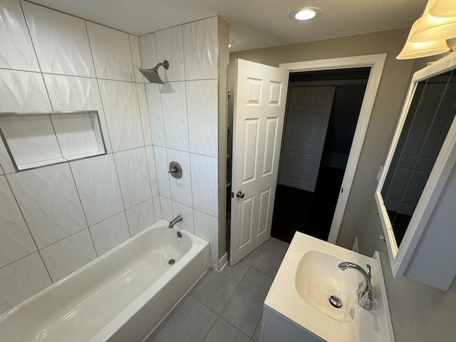 bathroom featuring tile patterned floors, recessed lighting, shower / tub combination, and vanity