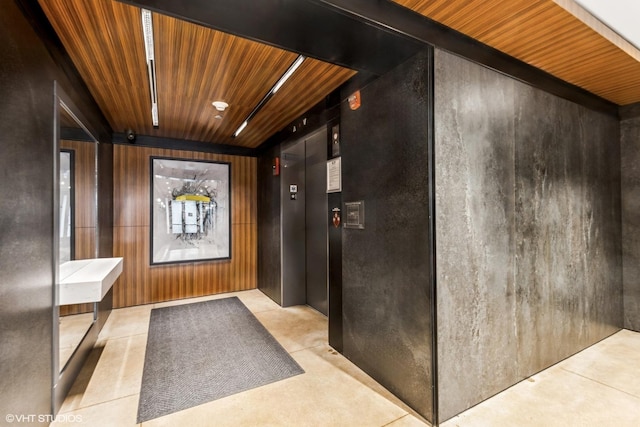 hall with wood ceiling