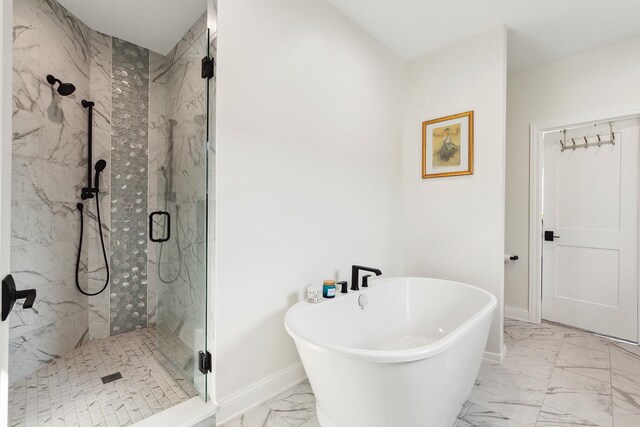 412 N Cass St Unit 4, Westmont, IL 60559 - bathroom featuring a marble finish shower, marble finish floor, baseboards, and a freestanding bath