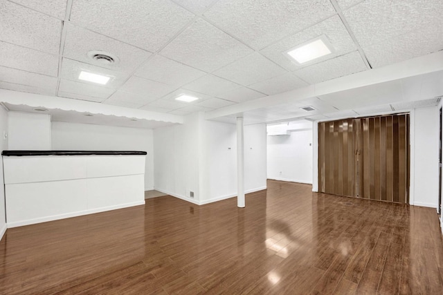 2232 S 2nd Ave, North Riverside, IL 60546 - finished basement featuring a paneled ceiling, visible vents, wood finished floors, and baseboards