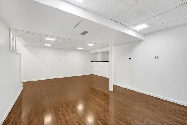 2232 S 2nd Ave, North Riverside, IL 60546 - basement featuring a paneled ceiling, visible vents, wood finished floors, and baseboards