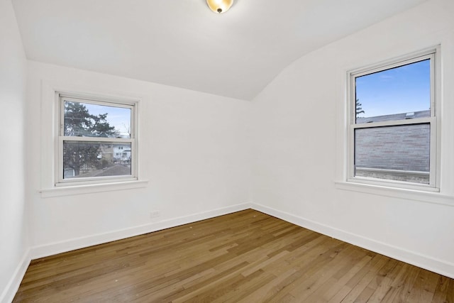 2232 S 2nd Ave, North Riverside, IL 60546 - bonus room featuring baseboards, wood finished floors, a wealth of natural light, and lofted ceiling