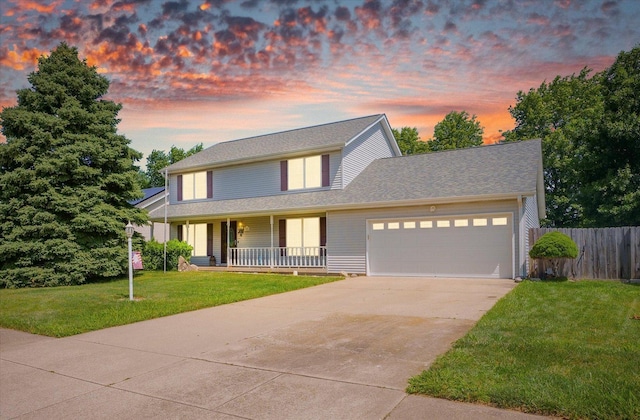 3504 Royal Oak Ct, Champaign, IL 61822 - view of front facade with an attached garage, a porch, and concrete driveway
