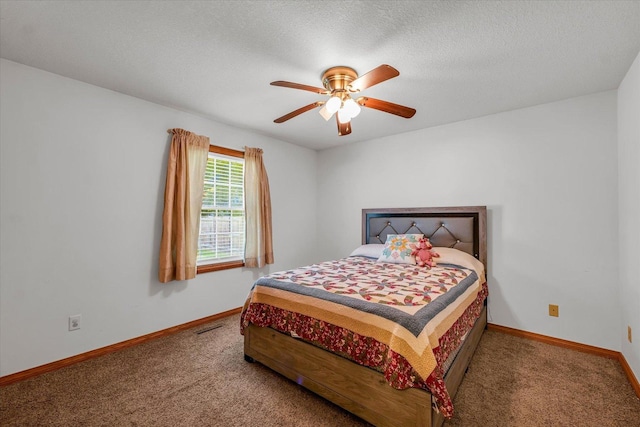 3504 Royal Oak Ct, Champaign, IL 61822 - carpeted bedroom featuring baseboards and ceiling fan