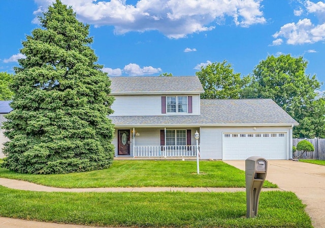 3504 Royal Oak Ct, Champaign, IL 61822 - traditional home with a garage, concrete driveway, covered porch, and a shingled roof