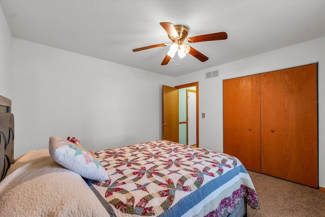 3504 Royal Oak Ct, Champaign, IL 61822 - carpeted bedroom with a closet and ceiling fan
