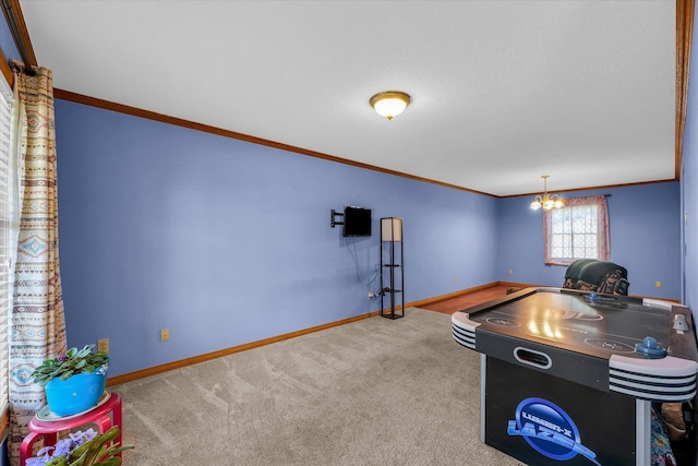 3504 Royal Oak Ct, Champaign, IL 61822 - playroom featuring carpet floors, ornamental molding, and a chandelier