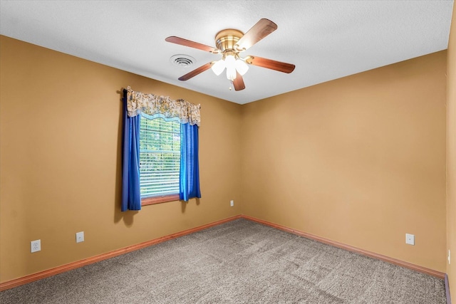 3504 Royal Oak Ct, Champaign, IL 61822 - empty room featuring carpet and ceiling fan