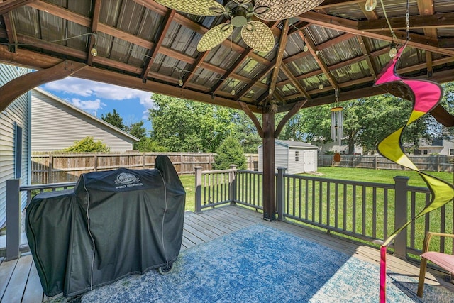 3504 Royal Oak Ct, Champaign, IL 61822 - deck with a shed, ceiling fan, a fenced backyard, and grilling area