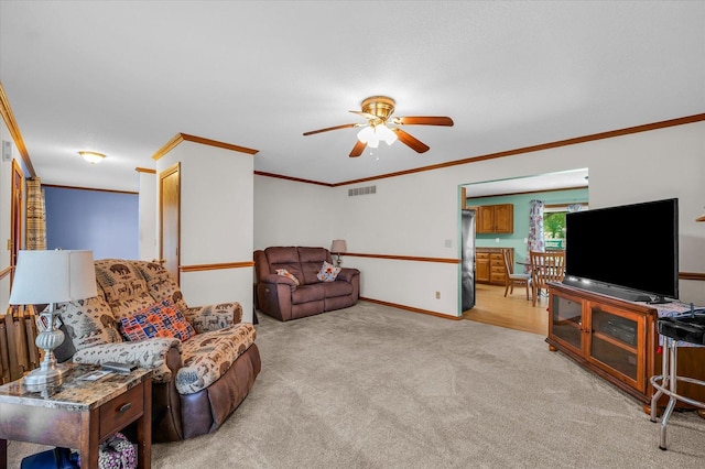 3504 Royal Oak Ct, Champaign, IL 61822 - living area with ornamental molding, ceiling fan, and carpet