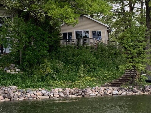 24109 64th Pl, Paddock Lake, WI 53168 - back of house with stairway and a deck with water view