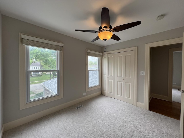 1108 N Devonshire Rd, Buffalo Grove, IL 60089 - unfurnished bedroom featuring carpet flooring, baseboards, a closet, and ceiling fan
