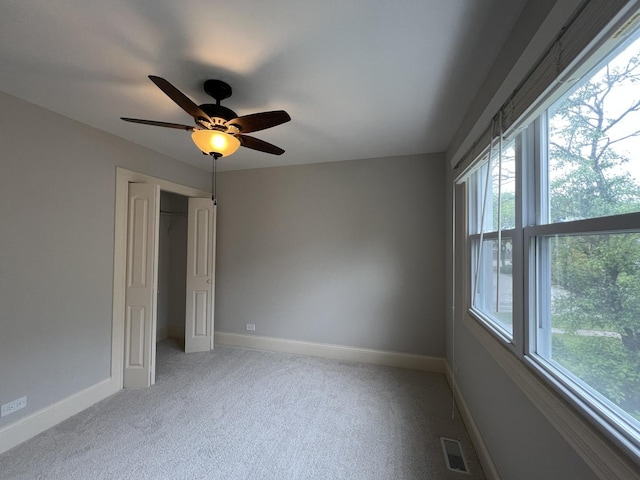 1108 N Devonshire Rd, Buffalo Grove, IL 60089 - empty room featuring carpet floors, a ceiling fan, and baseboards
