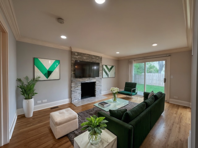 1108 N Devonshire Rd, Buffalo Grove, IL 60089 - living area with ornamental molding, a stone fireplace, baseboards, wood finished floors, and recessed lighting