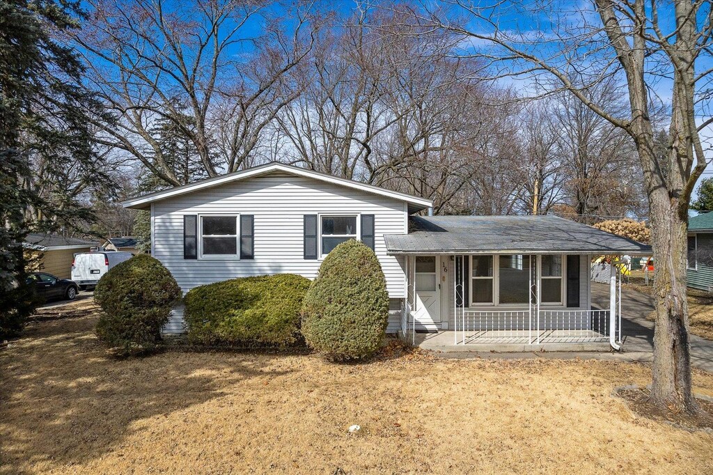tri-level home featuring a porch