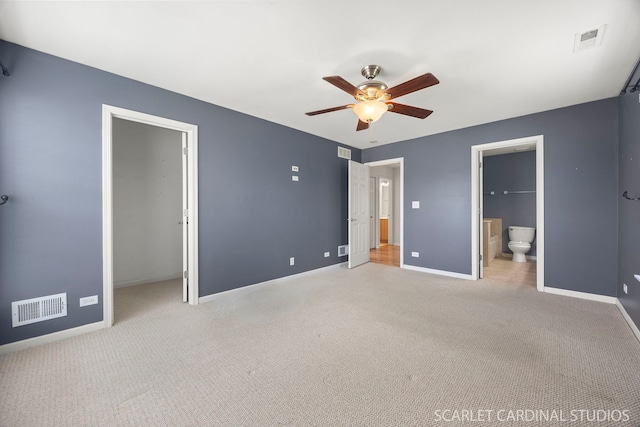 2319 Georgetown Ct, Aurora, IL 60503 - unfurnished bedroom featuring light colored carpet, ceiling fan, and ensuite bathroom