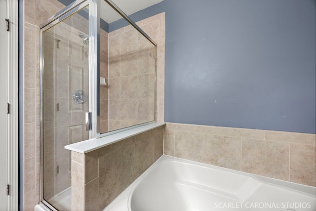 2319 Georgetown Ct, Aurora, IL 60503 - bathroom with a garden tub and a shower stall