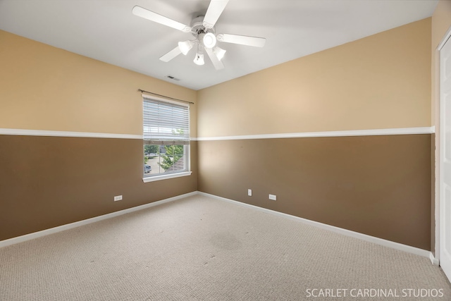 2319 Georgetown Ct, Aurora, IL 60503 - carpeted spare room with baseboards and a ceiling fan